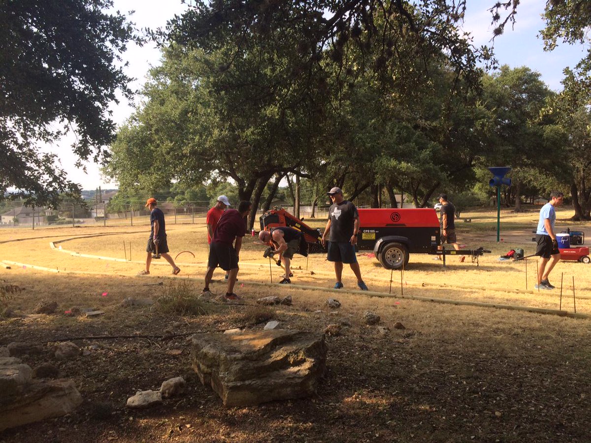 Volunteers rallied today - landscaping, painting, trash collection, decorating and completing the New Doss Track!