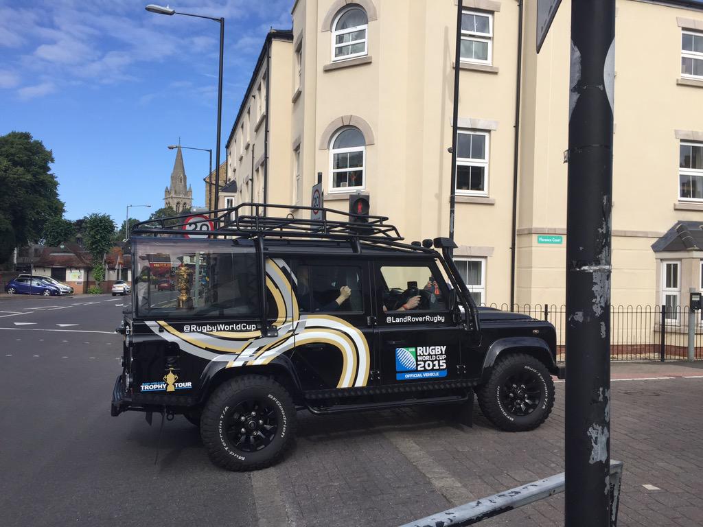 peter_wilson1's tweet photo. Just seen the #RugbyWorldCup arrive in Rugby in the back of a fantastic @LandRover_UK Defender! http://t.co/NKP7Geh8QD