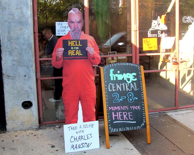 HellTheMusical's tweet photo. HIFR has a song "Selfie With Charles Manson." We made this standup and placed it outside Fringe Central.  .@FringeNYC http://t.co/DvjikDLrvM