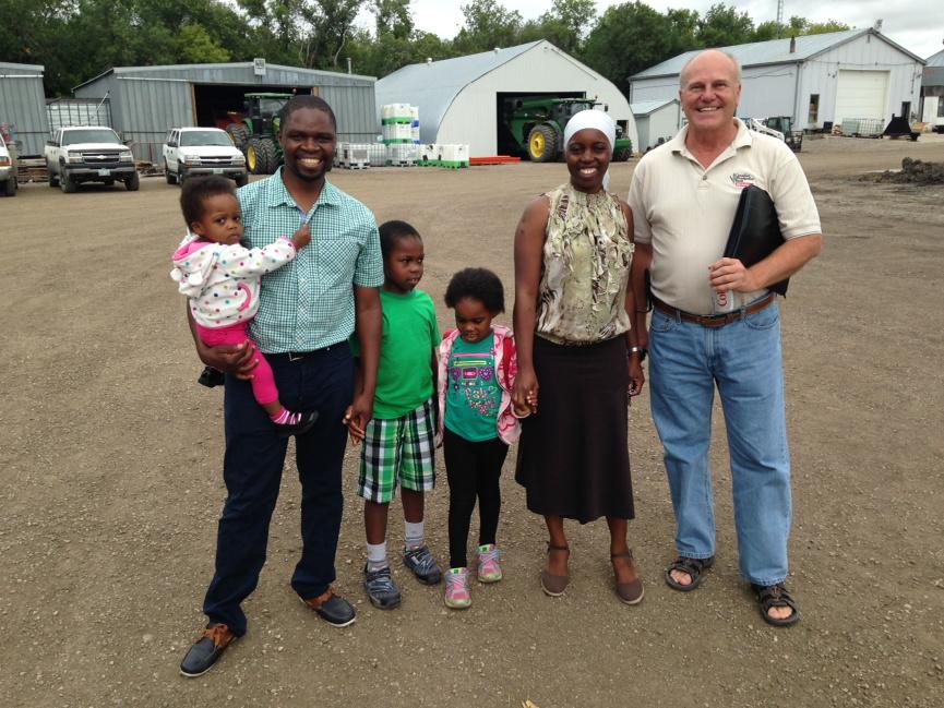 Foodgrains's tweet photo. Some of the folks gathering for the #GrowHopeMB harvest celebration this afternoon at Artel Farms @MCCManitoba http://t.co/8pOHWd9CuT