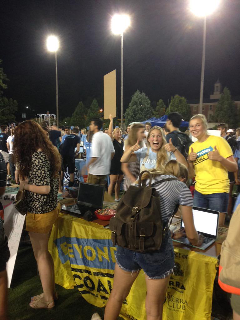 UNCBeyondCoal's tweet photo. Lots of students are here at #UNCFallFest signing up to #QuitCoal http://t.co/nGxkpGaNrg
