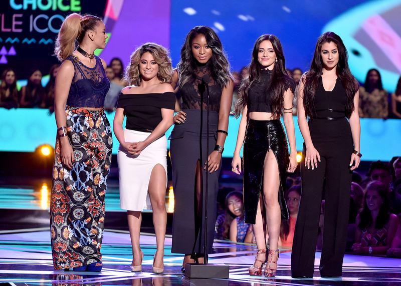 Fifth Harmony on stage presenting the #CandiesStyleIcon award at the #TeenChoiceAwards (via @5HNews)