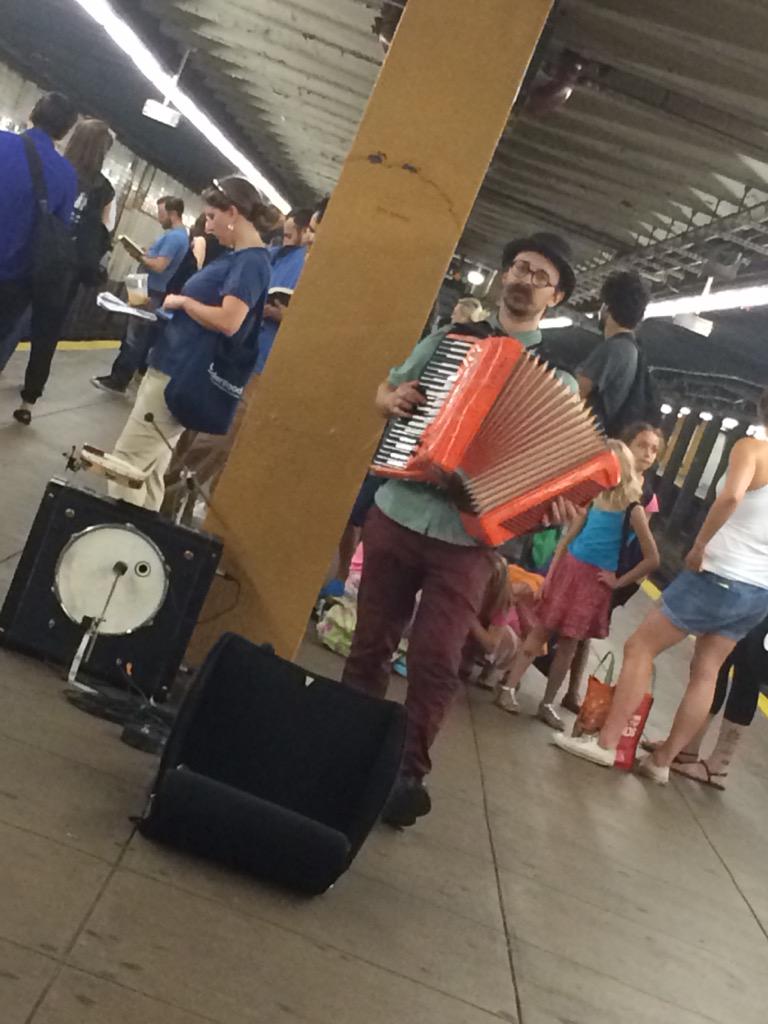This dude is currently terrorizing everyone on the F train platform with his accordion, drum kit and mustache.