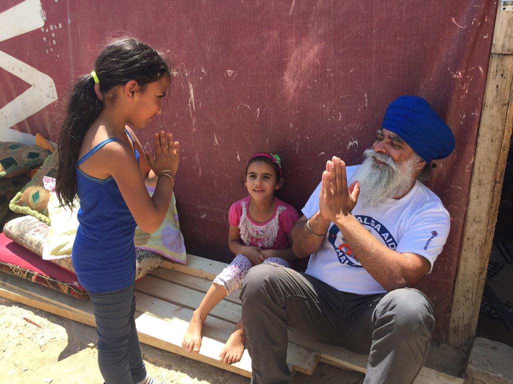 RaviSinghKA's tweet photo. A Syrian Refugee girl greeting me in my language ( Panjabi) in a refugee camp in Lebanon. God bless these Angels http://t.co/USbpnLGKHK