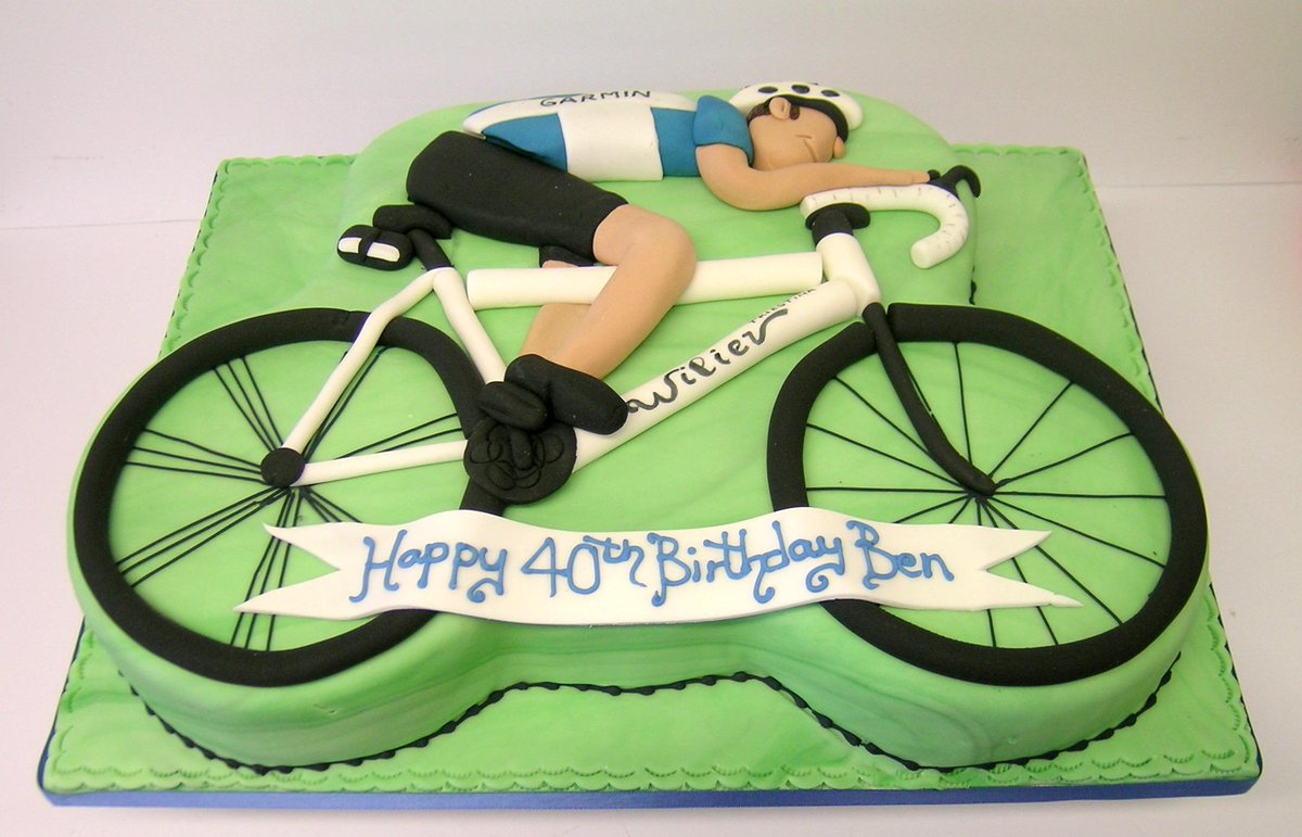 wackycakes's tweet photo. Large cycling cake. One wheel is a chocolate cake, the rest is
 vanilla sponge. Everything is made from sugar http://t.co/MLgHFcGQe1