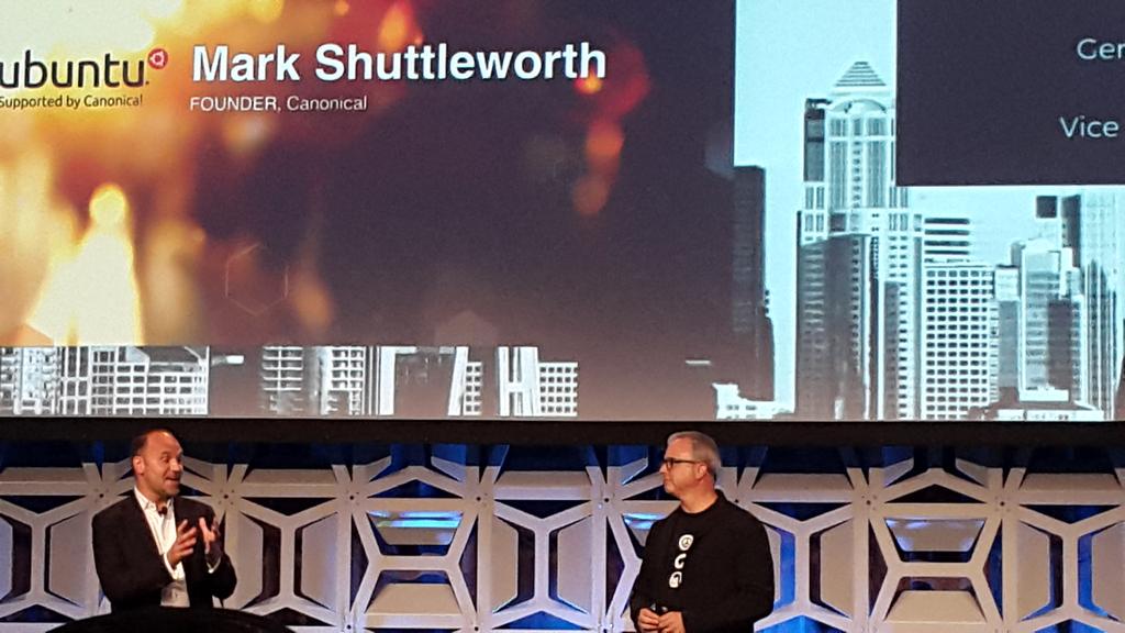 dipsarma's tweet photo. Mark Shuttleworth and Ross Mauri announcing Ubuntu availability on IBM mainframe. http://t.co/whB3ilCRTF
