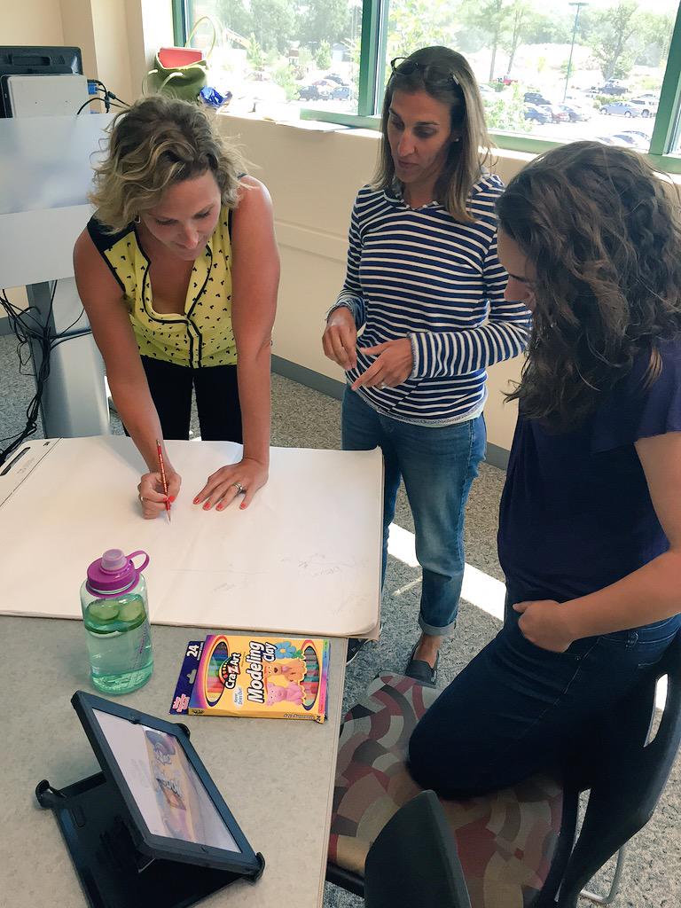 ShawnCRubin's tweet photo. Its creation time at #FuseRI Bootcamp! @Mrs_DeVoe @StrtAWildRumpus &amp; @abmurphy22 story boarding their idea! http://t.co/DWmMYTfukY