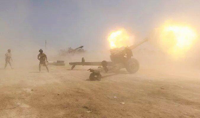 Iraqi__Army's tweet photo. مدفعية الاستخبارات العسكرية تقتل عشرات الدواعش و تدمر عجلتين تحمل احاديات باستهداف تجمعاتهم بمنطقة المزرعة في #بيجي http://t.co/oi12bWP6Gn