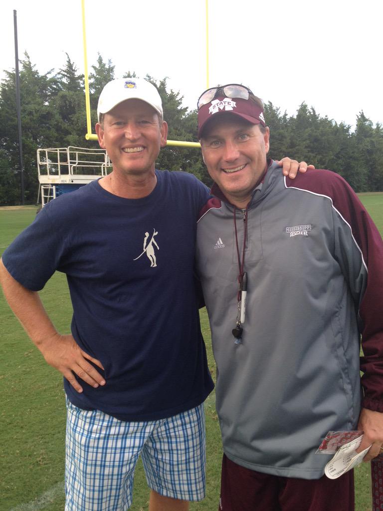 Preseason All-SEC QB @15_DakP and @CoachDanMullen meeting with @CoachNeuheisel after practice. #HailState