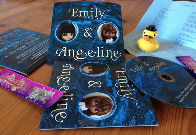 EmilyXAngeline's tweet photo. @EmilyXAngeline's bossy manager Dr Drake. See the blue lyric sheet? And the sweeties? @angelcakepie @Owltextures http://t.co/kw4KvtcSMj