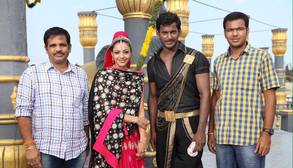 kajal_aggarwal_'s tweet photo. #paayumpuli movie still #Vishal,#KajalAggarwal and the team http://t.co/DHUcwYrimw