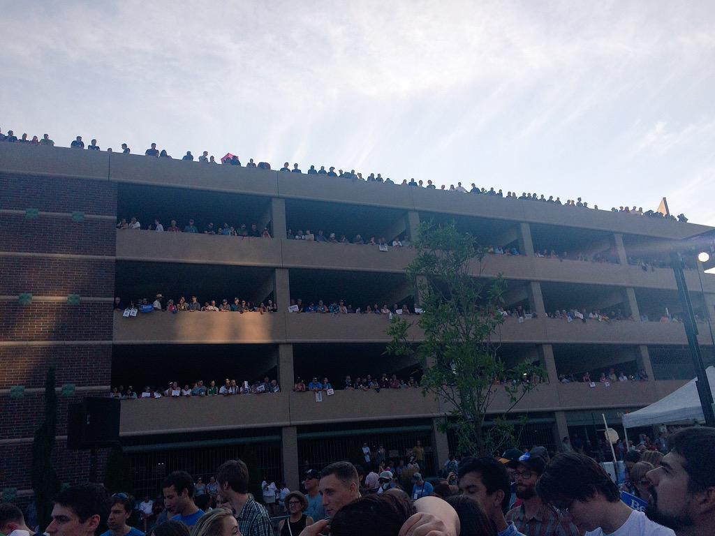 NVMediaAlliance's tweet photo. Rally participants are pouring out of the Whalen parking garage @unevadareno to see @BernieSanders http://t.co/E7tav0xX2A