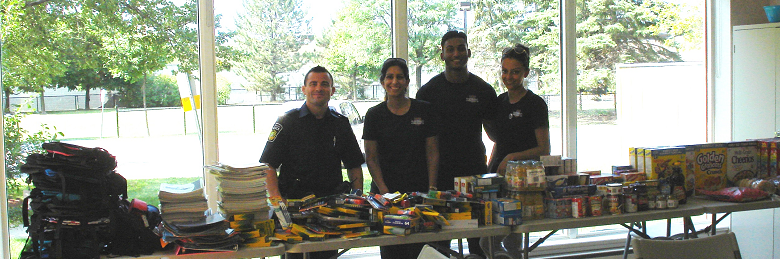 PeelPolice's tweet photo. #CramACruiser event held by 21Div. #PCLC raised funds & received donations for #FamiliesofVirtue #BackToSchoolProgram http://t.co/1T9Q1TlhnW