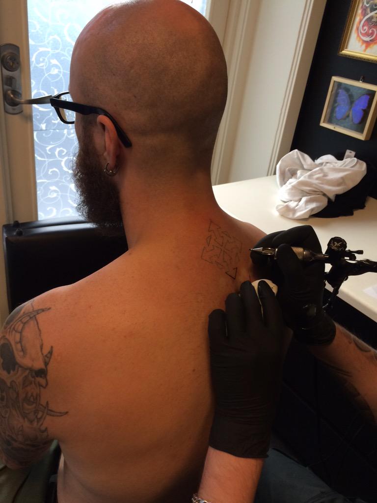 TrollfesT_Band's tweet photo. Another one branded by #Kaos #tattoo #SymbolicInk http://t.co/cP0iwN0V5W