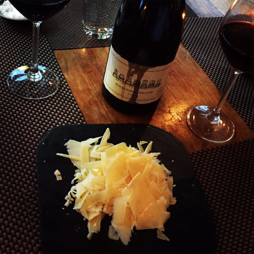 A plate of #Comte cheese and Boekenhoutskloof Syrah. Keeping it simple. #cheese #wine
