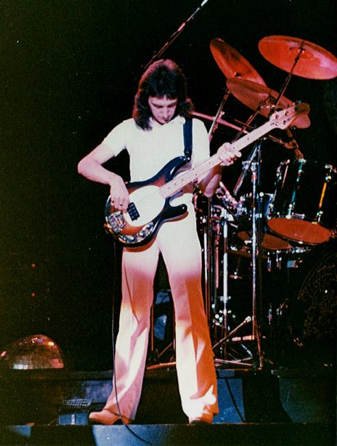 Happy Birthday to bassist John Deacon. Here he is w/ an early Music Man Stingray used live + in studio 