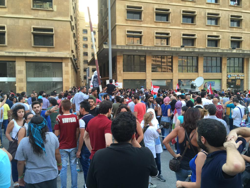Sound grenade fired, protestors ran back in a panic, now returning, chanting "down with the regime" #youstink