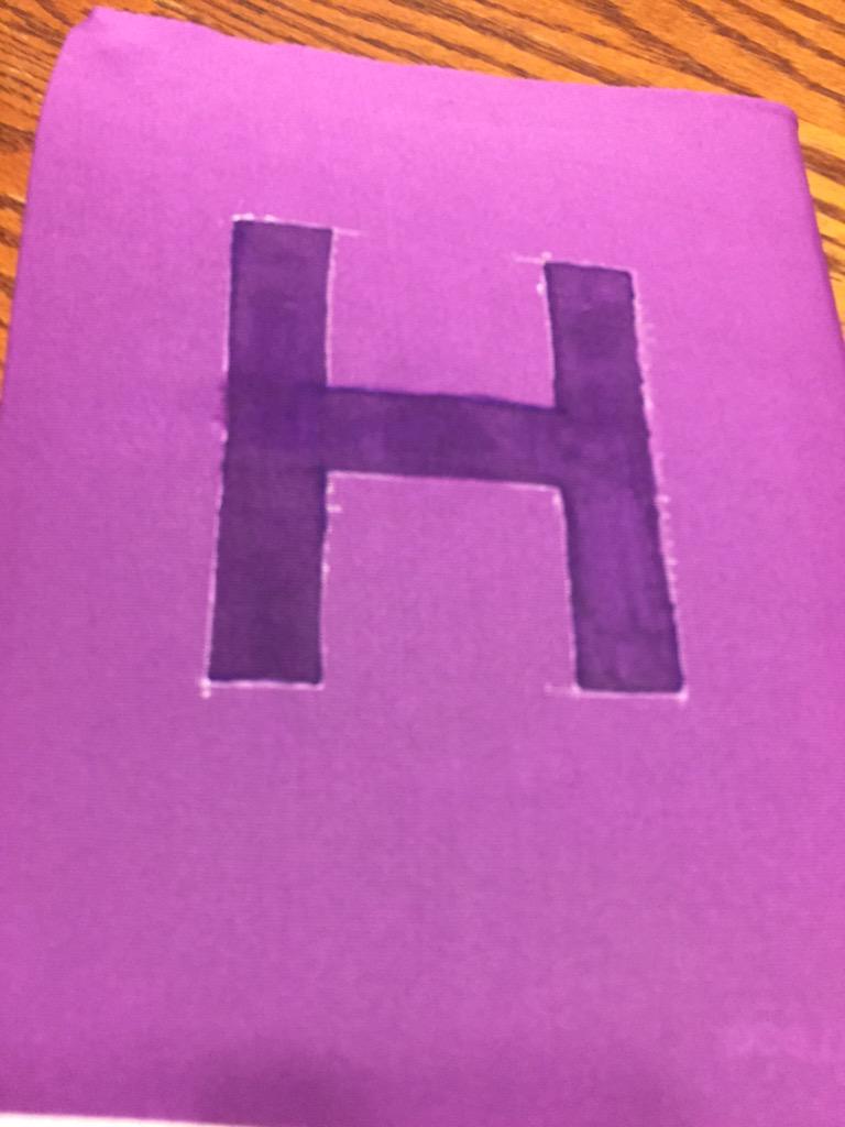 || also, I finally started working on a Hawkeye Notebook cover. Once it dries I can clean the white off.