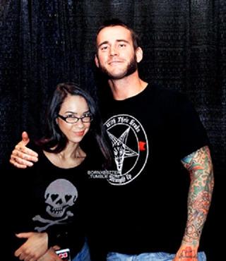 MissYouAJ's tweet photo. Miss You @AJBrooks &amp; @CMPunk !!! I'm always with you !! #TeamAJLee #TeamPunk http://t.co/R5MZfLoXmU