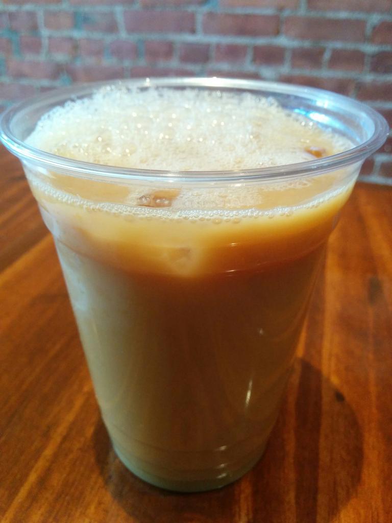 Iced coffee with almond milk. We are open #sevenstreetjc #downtownjc #coffeeshop #hamiltonparkjc