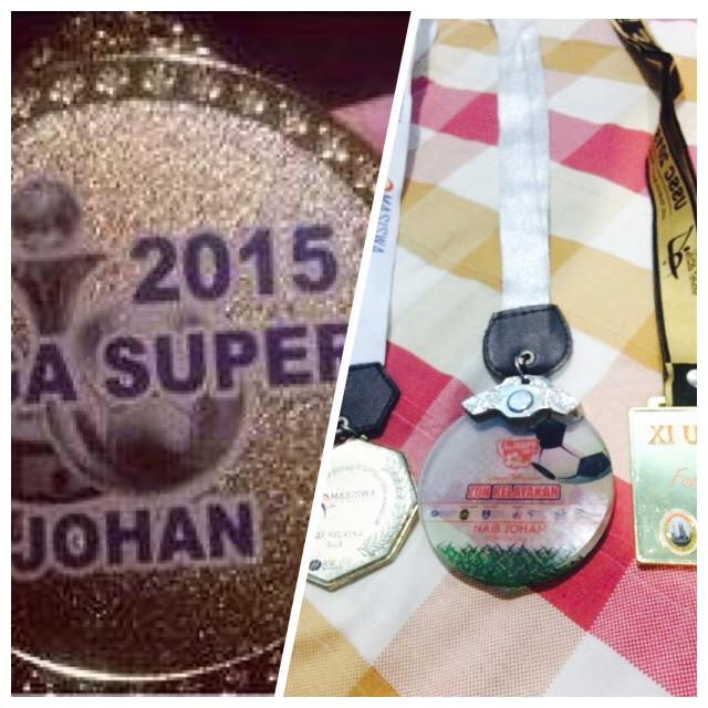 Perbandingan antara pingat johan liga super 2015 dengan pingat liga ipt