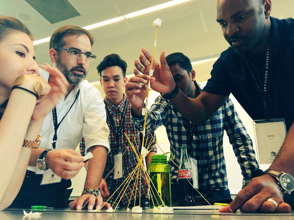 MariusUrsache's tweet photo. Here's what an MIT class of marshmallow-addict entrepreneurs looks like! #MITxBootcamp #marshmallowchallenge http://t.co/lzeDP501PI