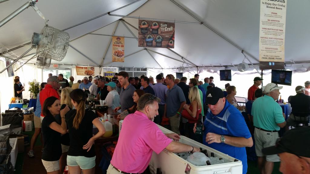 VOL_Chad's tweet image. Crowded at the @CC19thHole at the @KNSOPEN at Fox Den Country Club. @pkizzire 2 shot lead thru 14. #OrangeJacket