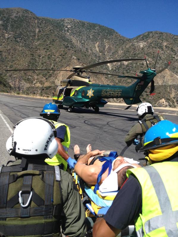 LASDHQ's tweet image. RESCUE. Please slow down. Motorcycle crash ACH Angeles National Forest @SEBLASD deputy medics airlift #SAR #LASD