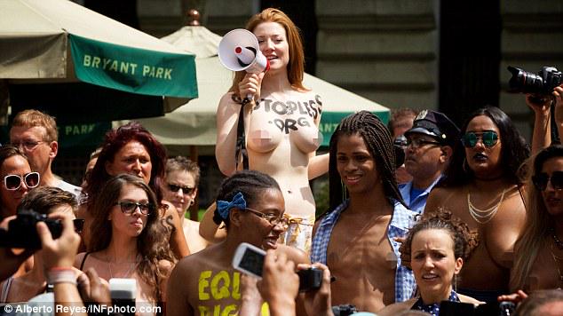 Daily_MailUS's tweet photo. Topless protesters take over New York and 60 other cities worldwide for #freethenipple http://t.co/FJlrS4IIX8 http://t.co/bUmb6PNXFb