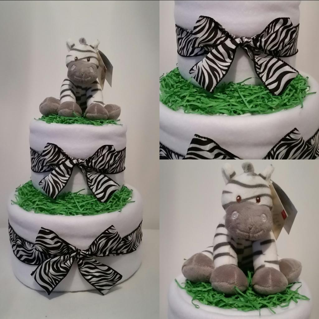 BabyNappyCake's tweet photo. #newdesign 2 tier #nappycake with #zooma #zebra #neutral #unisex #nappycakes #newbornbaby #maternitygift #babyshower http://t.co/B2GaH1IXIo