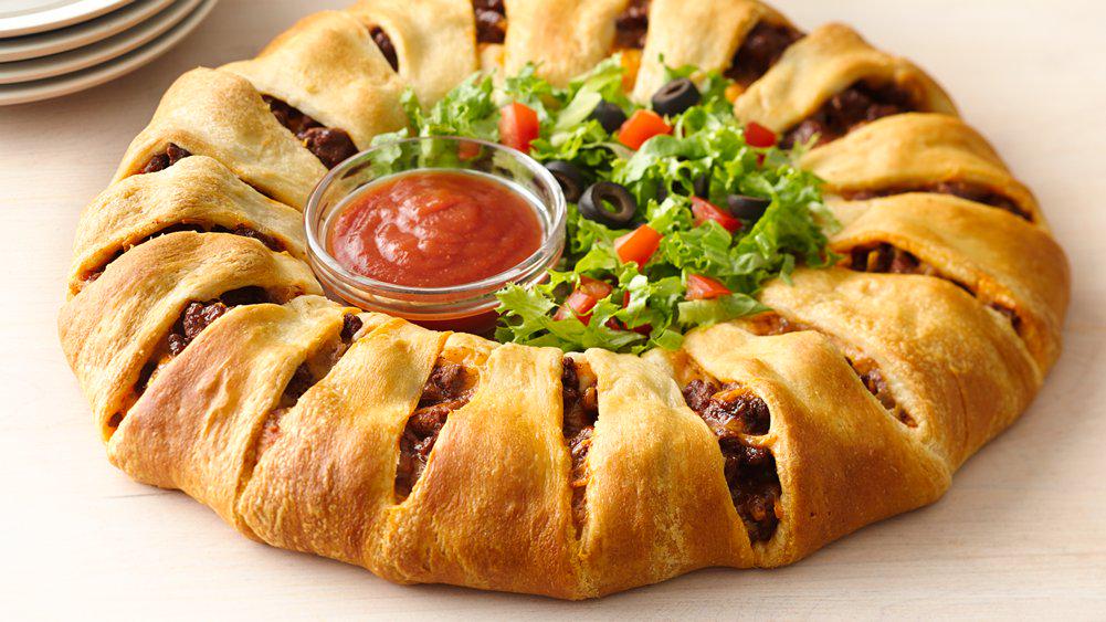 Pillsbury's tweet photo. Keep the fun going after the bus drops them off with a Taco Crescent Ring! http://t.co/4DQ0heHGpb #firstdayofschool http://t.co/jz9IyLAG1B