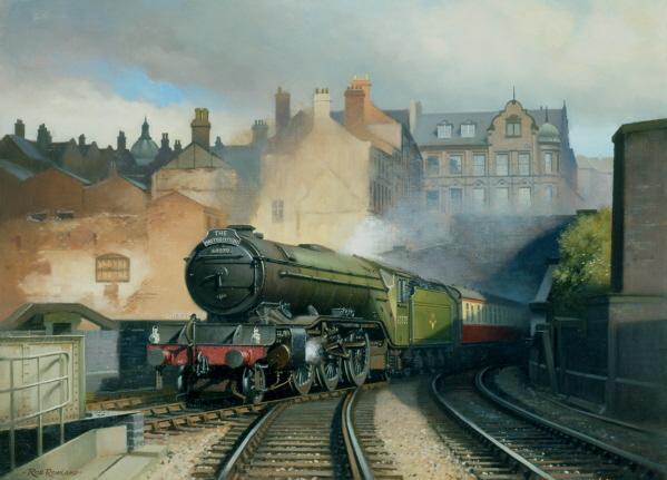 Here comes The Mastercutler behind a Gresley V2 2-6-2 locomotive.You can almost hear it rattle across these junctions