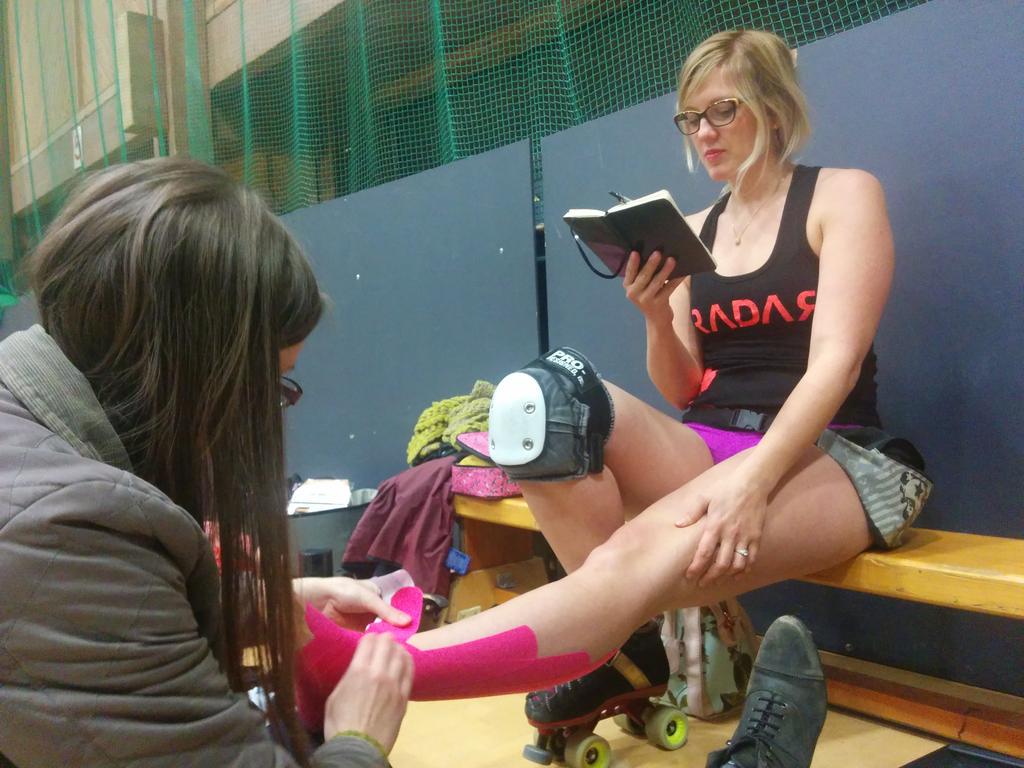 Remember that time @juke_boxx off of @ldnrollergirls carried on coaching us while we taped her ankle? #MultiTasking