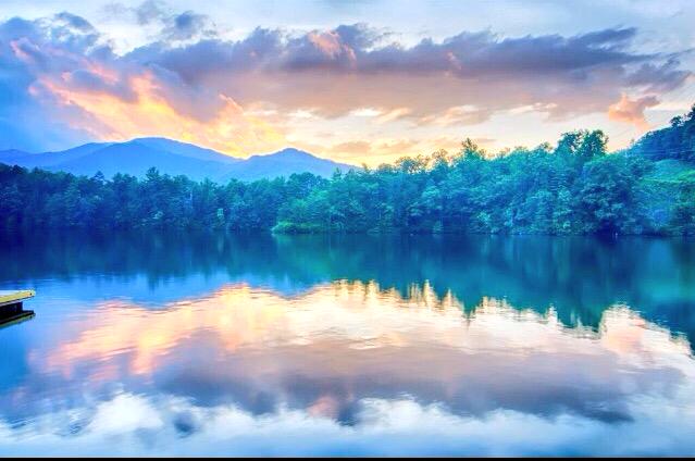 Like an impressionist painting, stunning Lake Santeetlah in Graham County, #NorthCarolina sits quietly at #sunset