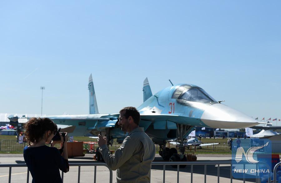 XHNews's tweet photo. MAKS-2015 aviation and space exhibition kicks off in Russia with spectacular aerobatics show http://t.co/zJljJL7qPV