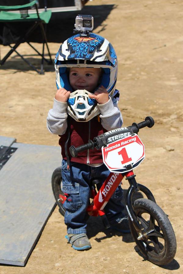 Wow, only 18 months old and already racing his Honda Strider like a champ!