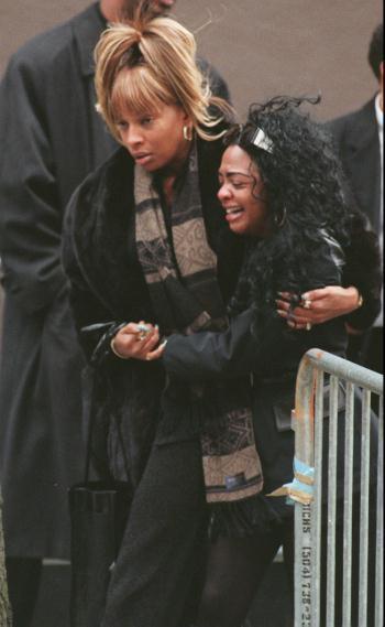 gigikittenu's tweet photo. The pictures of Lil' Kim leaving Biggie's funeral are so sad.. http://t.co/59nJy5edbE