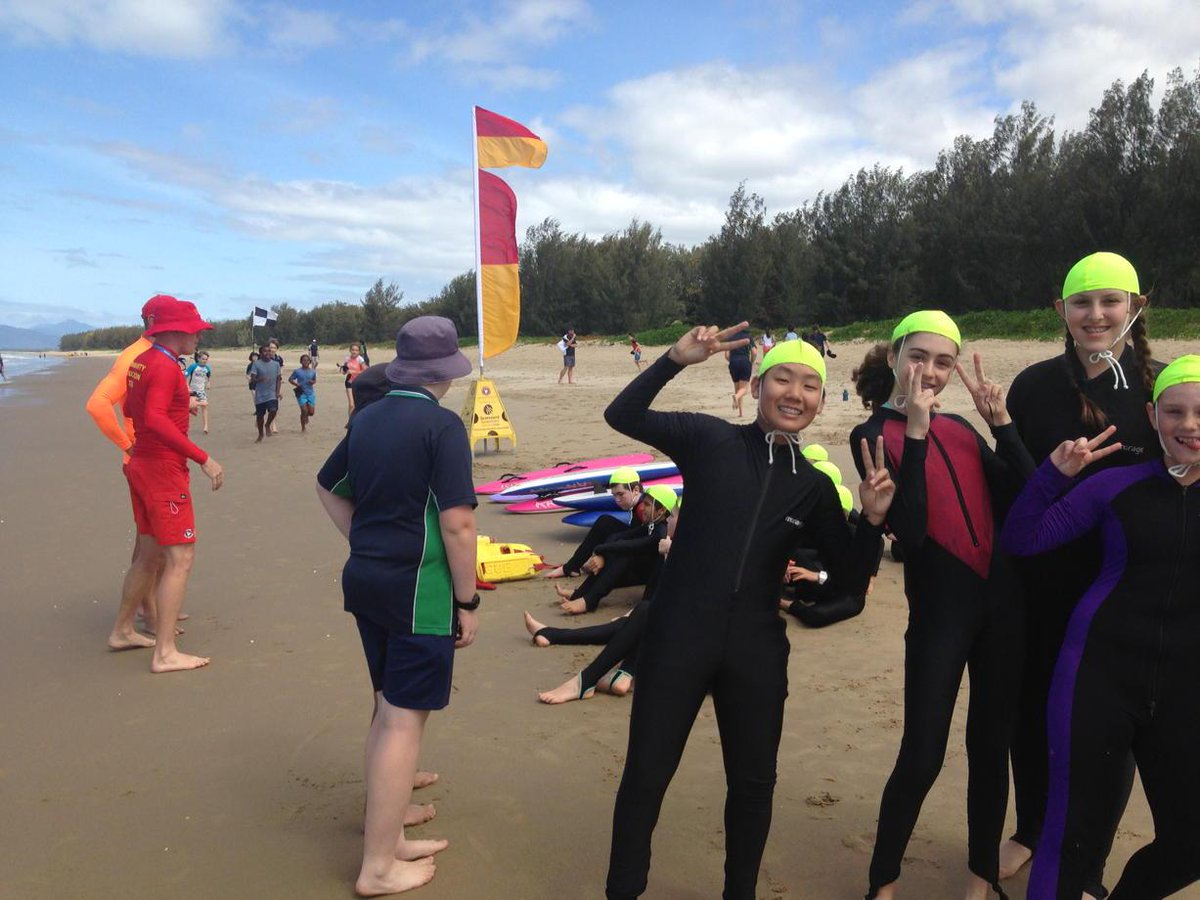 Plc year 6 and 7s learning surf life saving skills at Yorkey's Knob