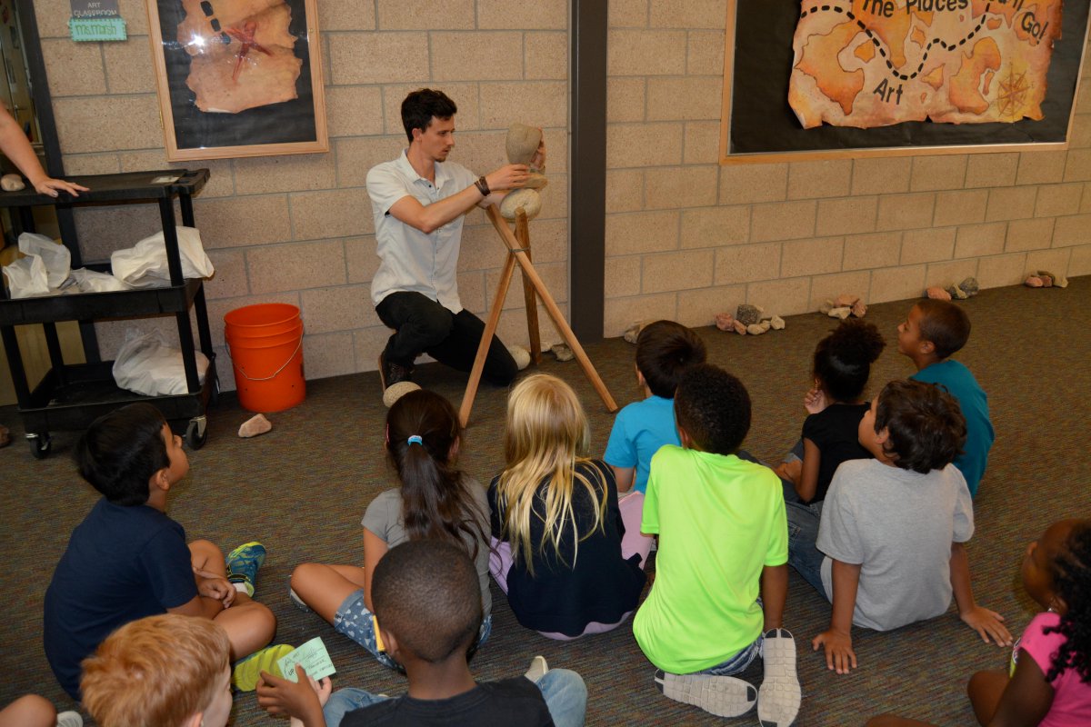 ryanremien's tweet photo. San Francisco-based artist, Travis Ruskus, showing our students the art and science behind rock-balancing. http://t.co/j9oXwIjFWF