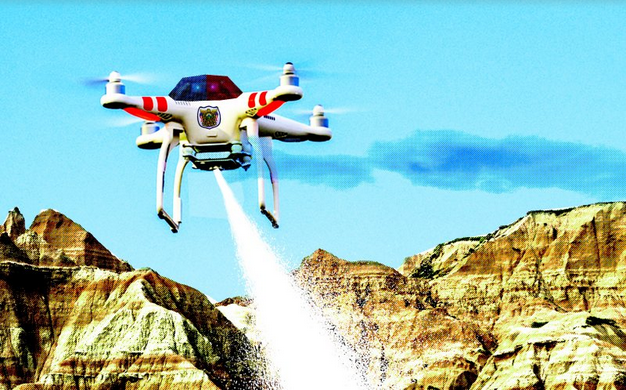 NatCounterPunch's tweet photo. It is now legal for law enforcement in North Dakota to fly drones armed with tasers, tear gas: http://t.co/ms6YyjaDcY http://t.co/T4J4FWzpV7