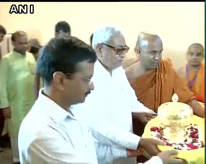 ANI's tweet image. Bihar CM Nitish Kumar &amp;amp; Delhi CM Arvind Kejriwal at Mahabodhi Temple in Bodh Gaya.
