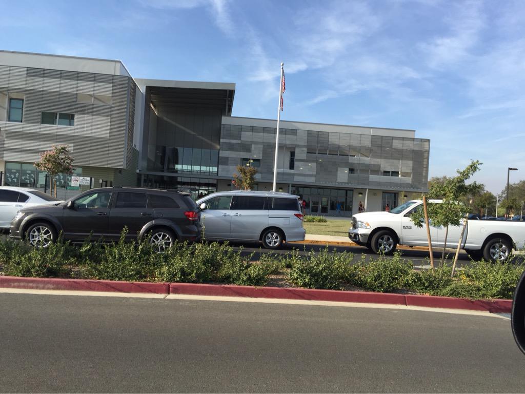 DocMartin2013's tweet photo. @WeisenbergerT  A full parking lot and a mile long parking line of cars to get to back to school at #lombardi #CabBSD http://t.co/h8DVYOYIU7
