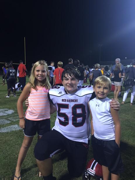 PoohCE's tweet image. Big Luke with Sarah Kathryn and Andrew after a big 47-0 win!
