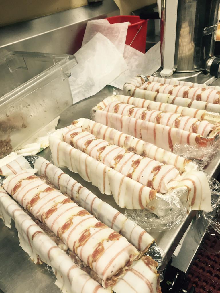 Guniea fowl Bologna wrapped in pancetta surrounded by pork and beef tongue pate