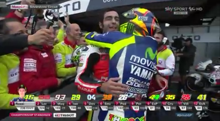 SkySportMotoGP's tweet photo. Orgoglio italiano: lungo abbraccio tra #Rossi e #Petrucci prima di salire sul podio del #BritishGP! #SkyMotori http://t.co/U0fV3hqpsT
