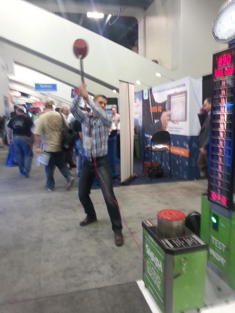 VMworld attendees playing carnival game at AirVM booth.