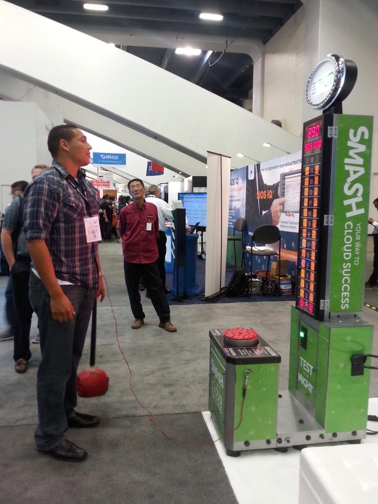 VMworld attendees playing carnival game at AirVM booth.