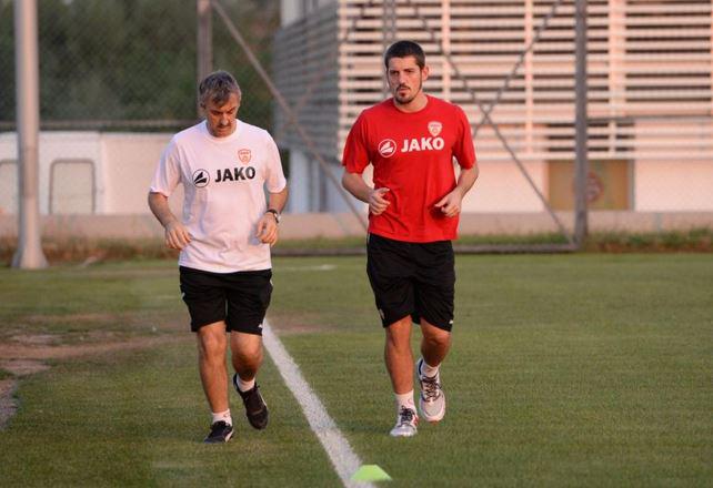 Ademi and Macedonia's lead doctor Viktor Kamiloski Ademi and Macedonia's lead doctor Viktor Kamiloski