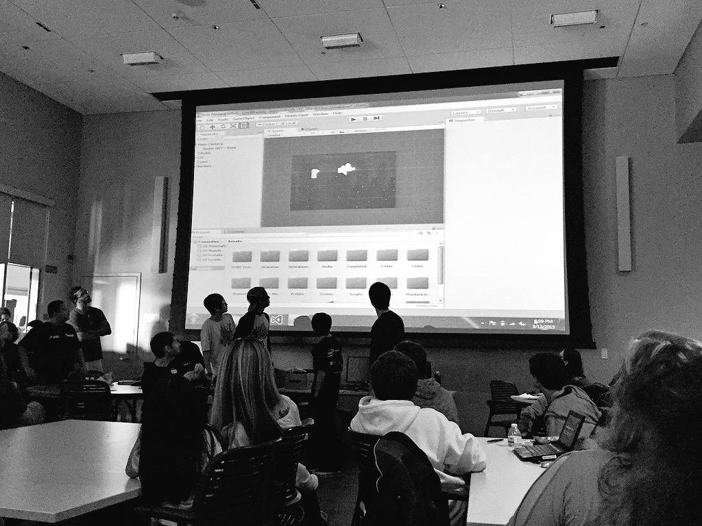 sacgamedevs's tweet photo. The 2D Guys showing off their demo. #westsacramento #LearnMakeCreate http://t.co/3fiDnZY8EJ