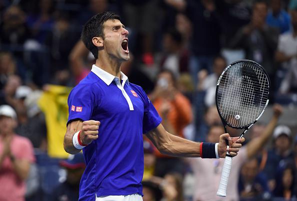 espn's tweet photo. The world No.1 earns his 10th major title! Novak Djokovic defeats Roger Federer to win the @usopen men's final. http://t.co/kIq8KsuqEq